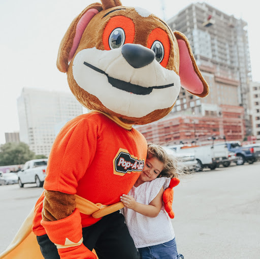 Pop-A-Lock mascot hugging young girl. Pop-A-Lock can take care of you!